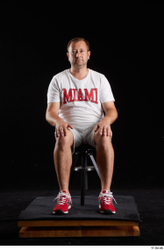 Whole Body Man White Sports Shirt Shorts Chubby Sitting Studio photo references